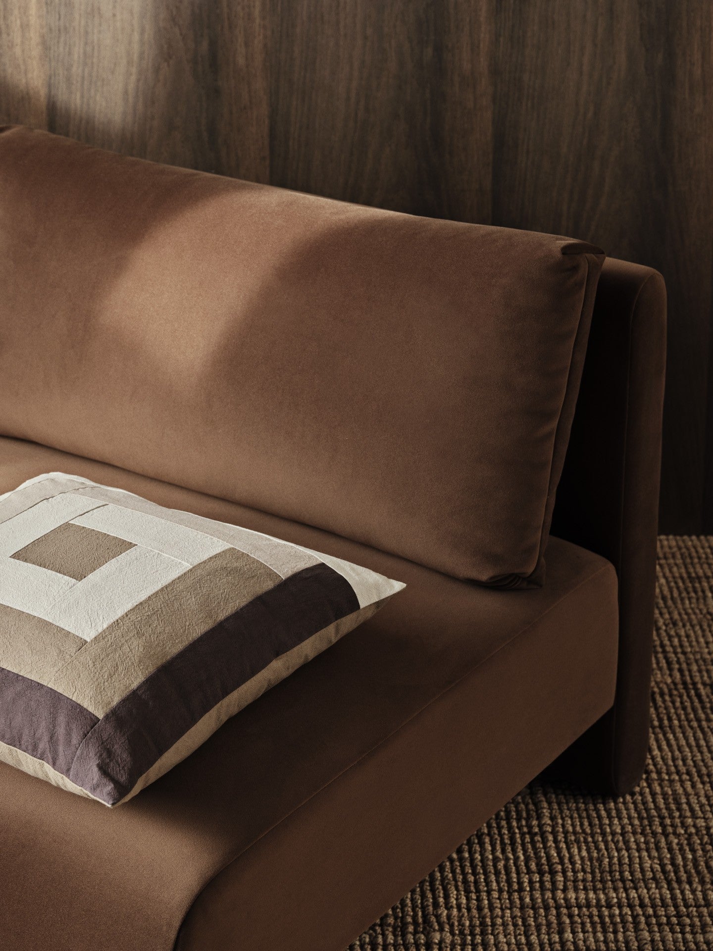 border patchwork cushion coffee