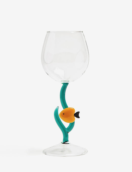 stemmed glass yellow fish
