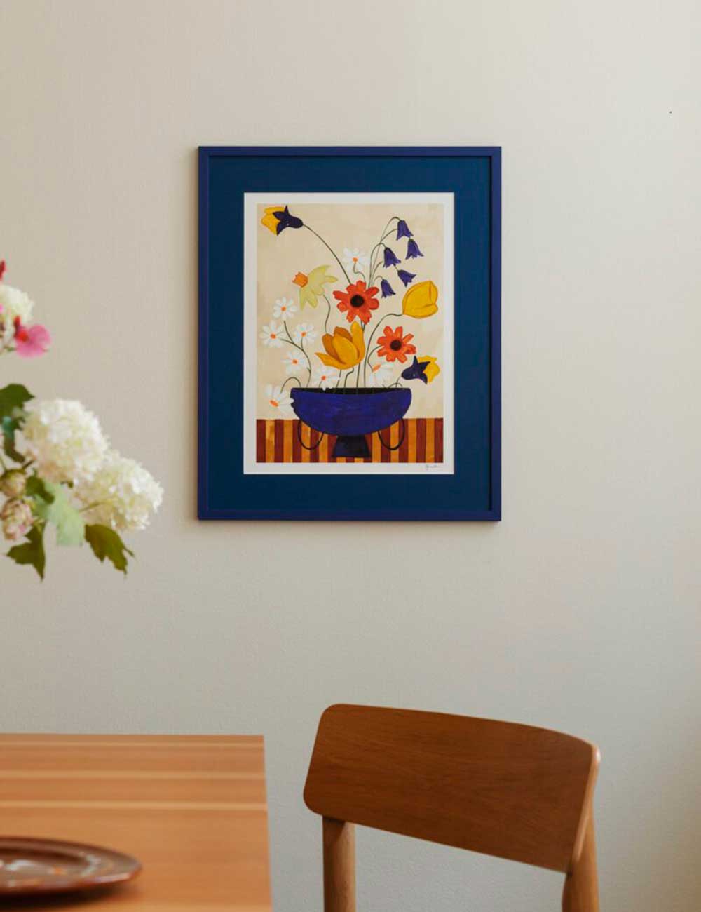 Colourful bunch in blue vase