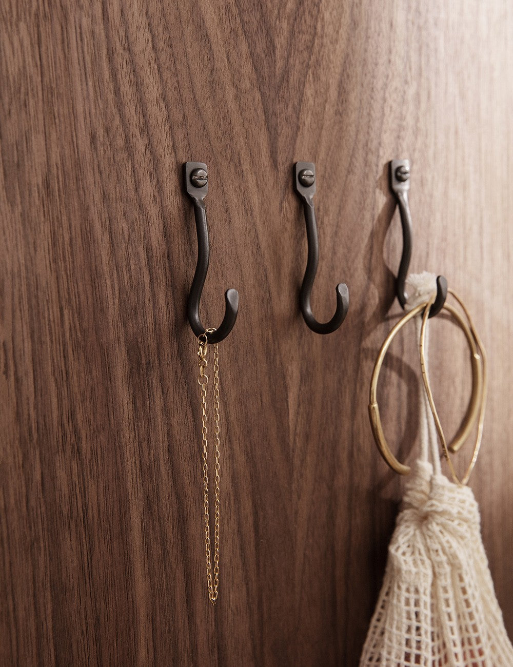 colgador curvature set black brass