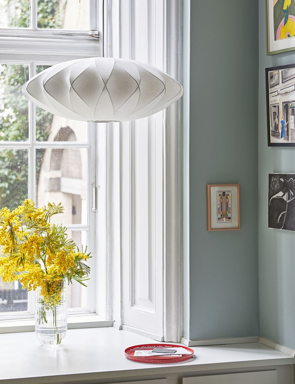 nelson saucer crisscross pendant