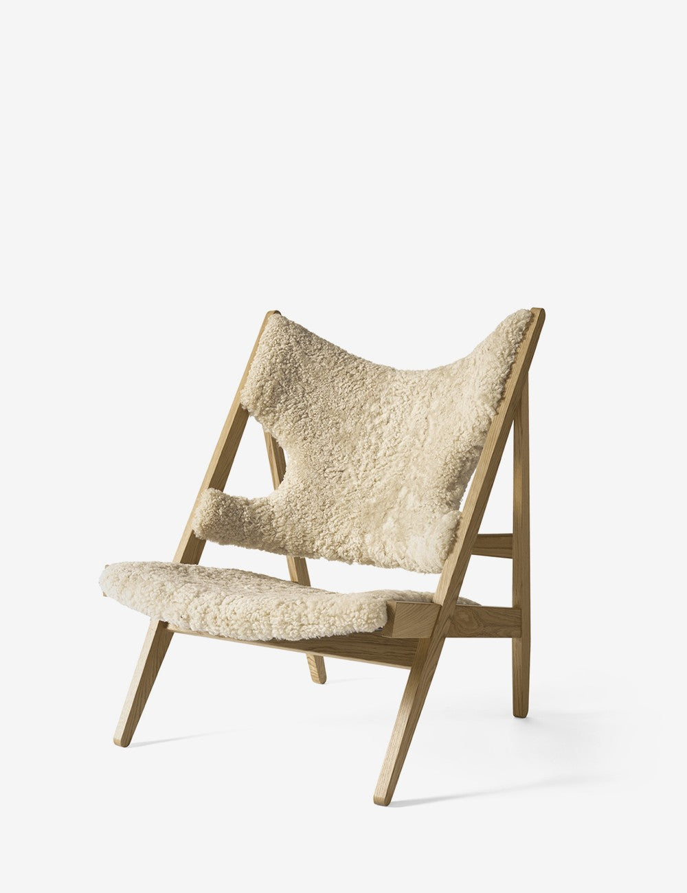 chaise longue tricotée en peau de mouton