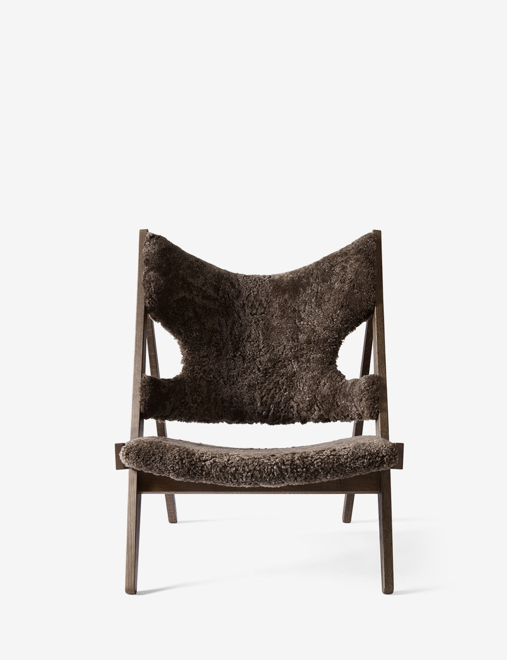 chaise longue tricotée en peau de mouton