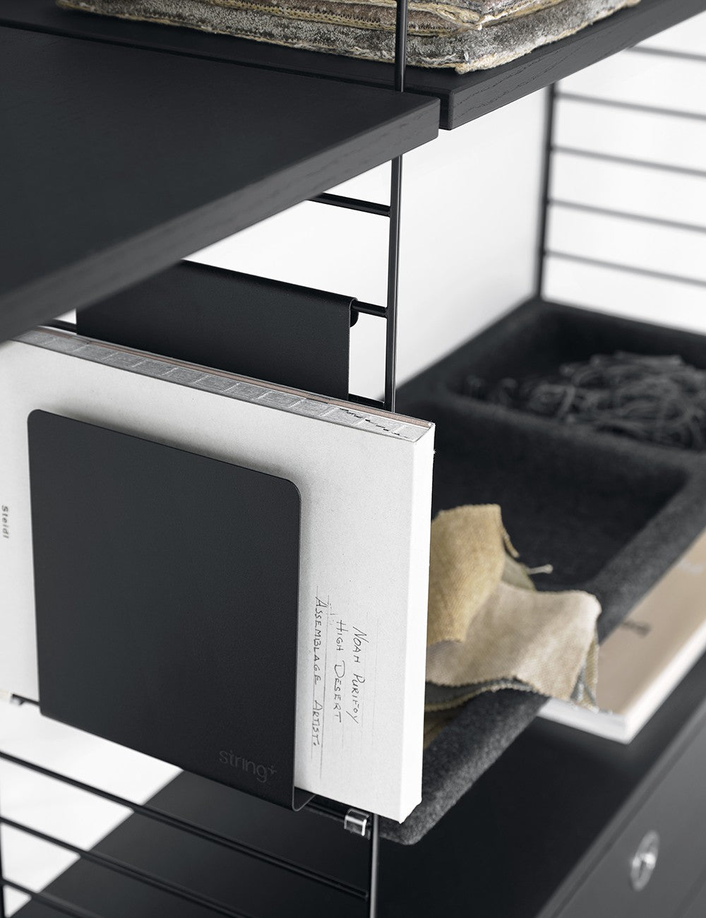 MAGAZINE HOLDER