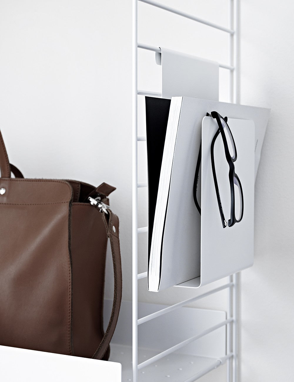 MAGAZINE HOLDER