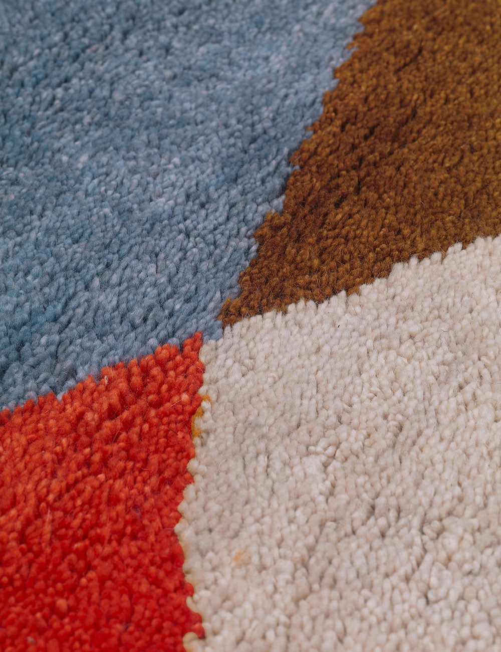 tapis noué arlequin