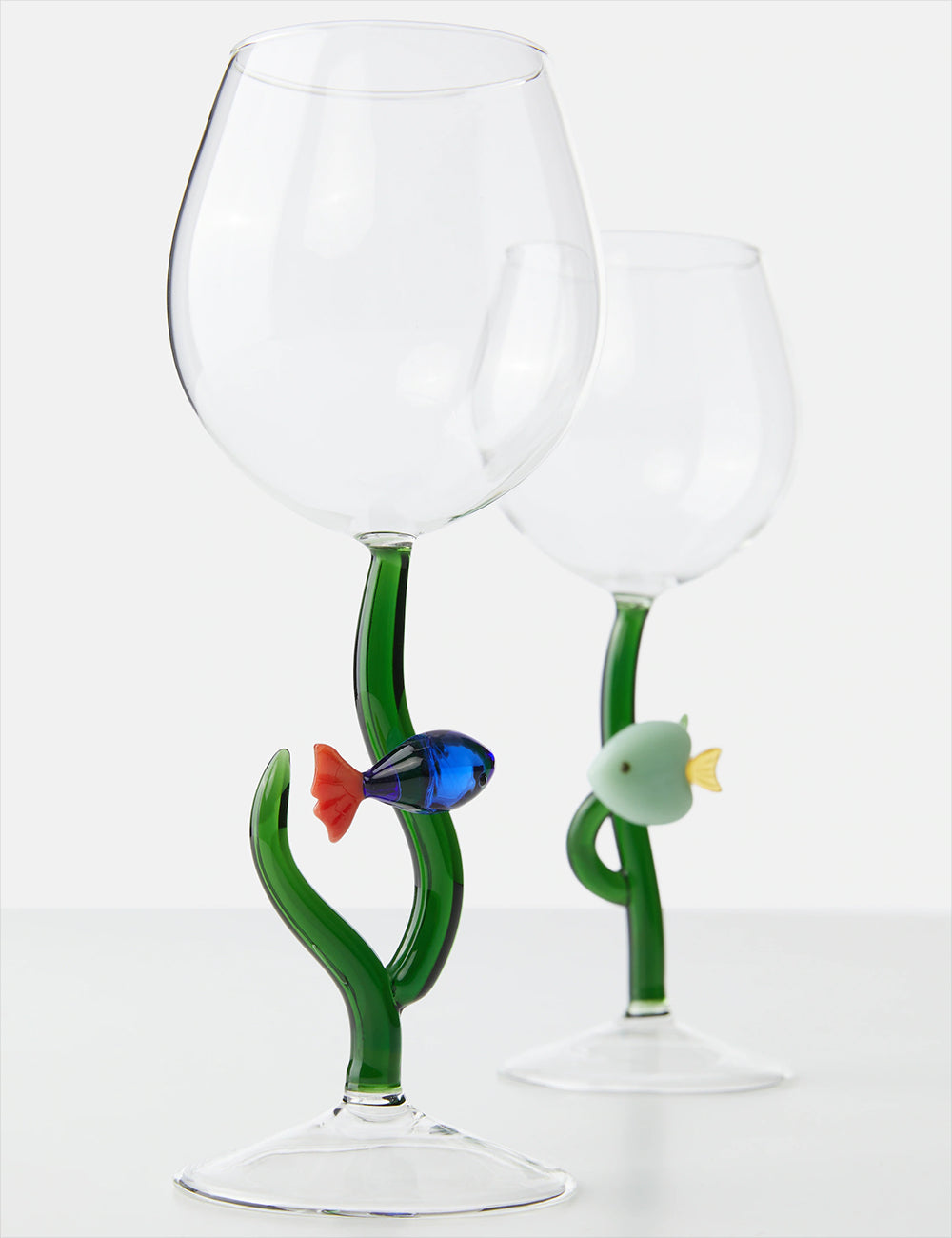 stemmed glass blue red fish
