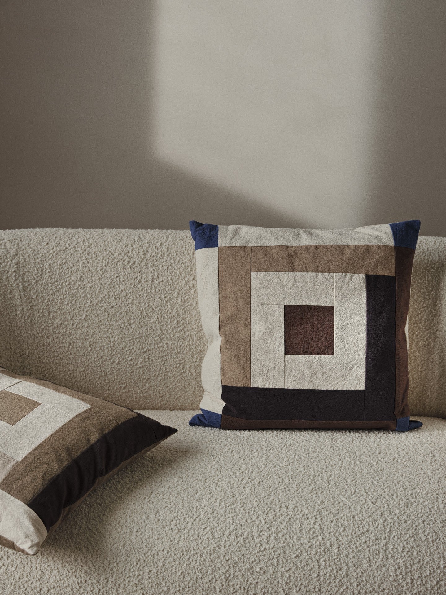 border patchwork cushion carob brown