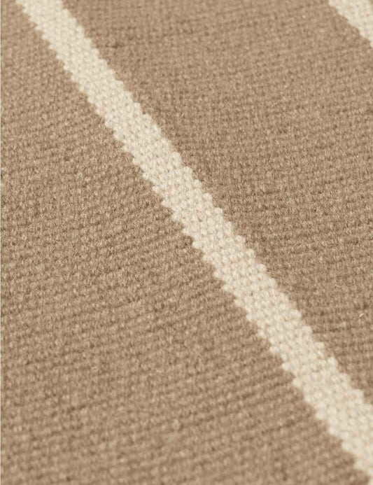 calm kelim rug sand