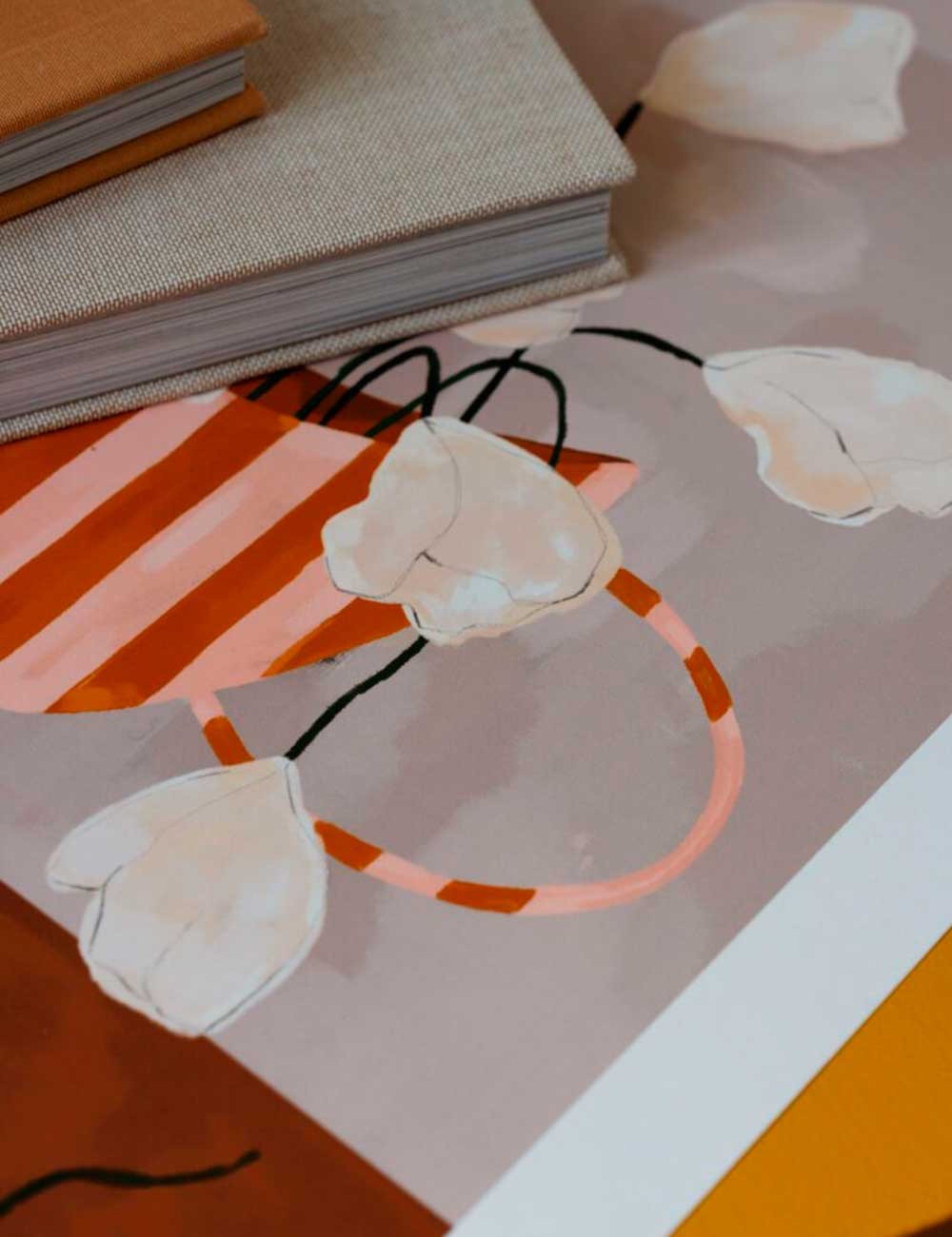 White flowers in striped vase